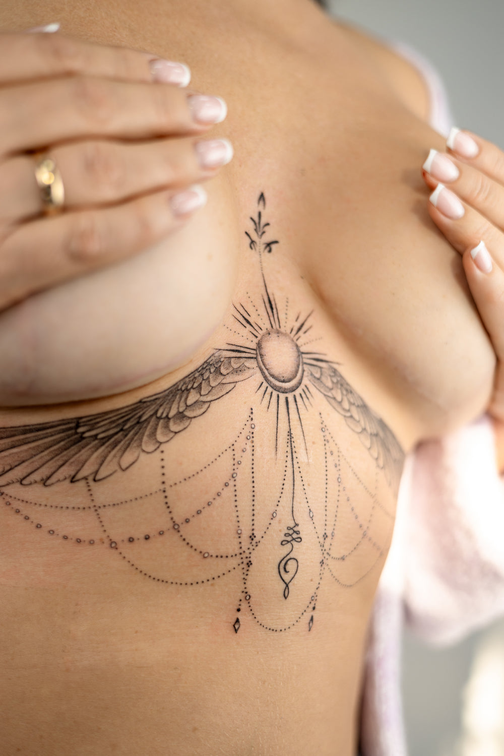 Tattoo design on a person's shoulder with intricate patterns